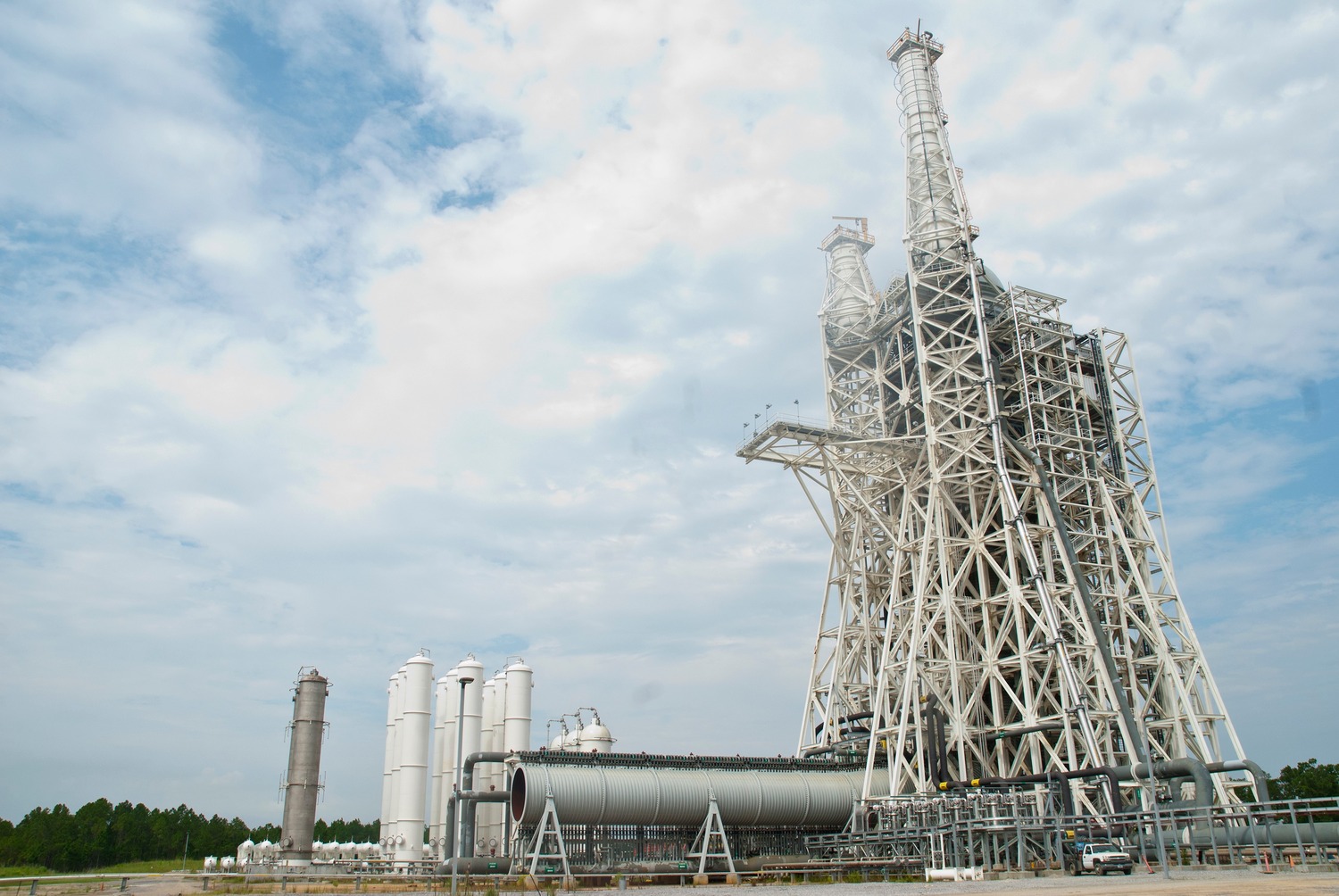 Building, Factory, Pickup Truck, Vehicle, Power Plant, Person, Lighthouse, Refinery, Bird, Construction Crane