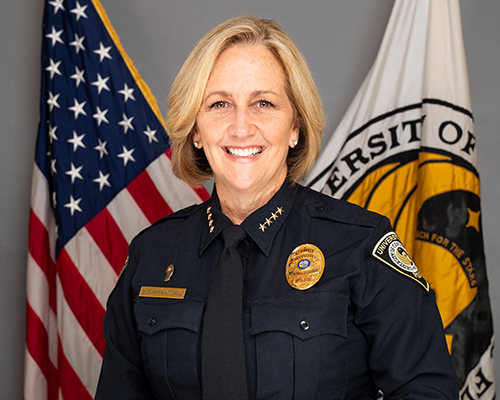 Flag, Adult, Female, Person, Woman, Officer, Police Officer, Captain, Formal Wear, Tie