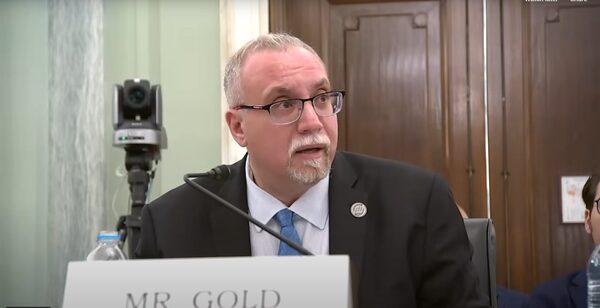 Head, Person, Face, Indoors, Adult, Male, Man, Angry, Suit, Courtroom