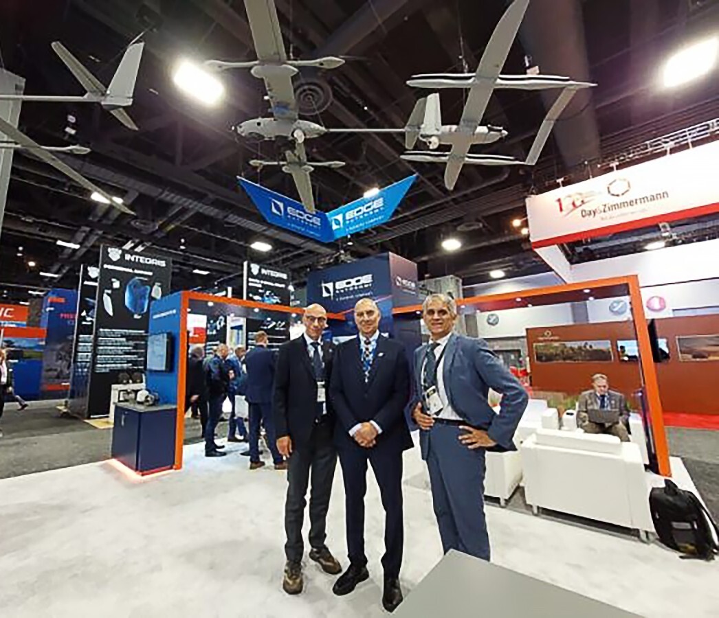Groupshot, Person, Airplane, Coat, Ceiling Fan, Suit, Head, Pants, Indoors, Face