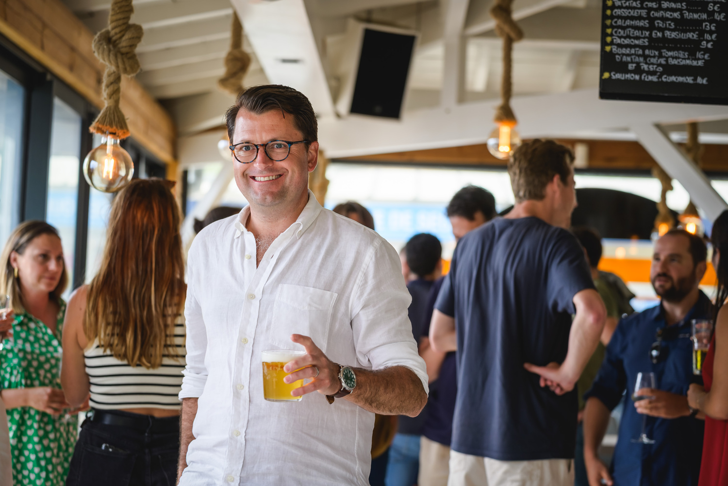 Glasses, Shirt, Adult, Male, Man, Person, Finger, Wristwatch, Beer, Wood