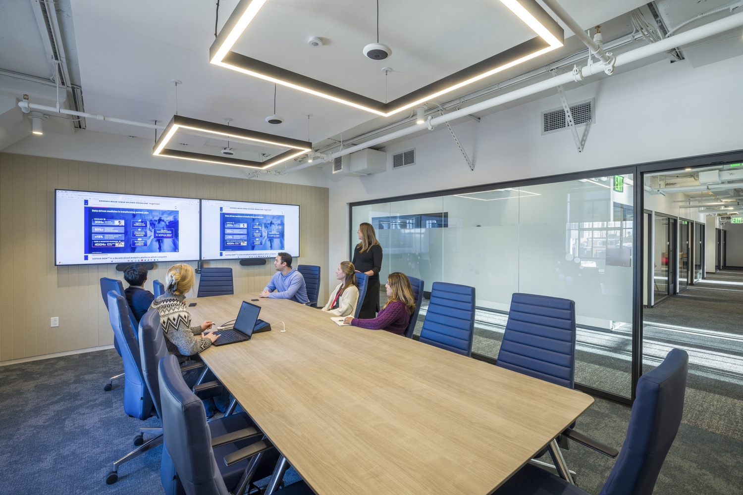 Indoors, Person, Chair, Laptop, People, Adult, Female, Woman, Meeting Room, Monitor