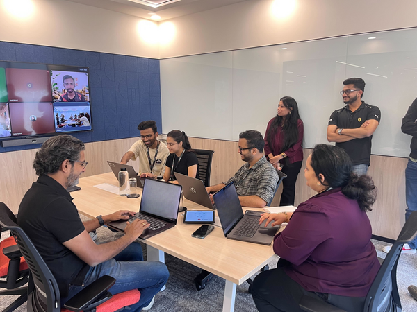 Adult, Female, Person, Woman, Mobile Phone, Male, Man, Laptop, Wristwatch, Glasses