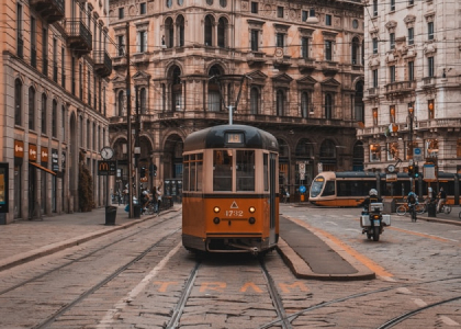 Cable Car, Vehicle, Streetcar, City, Helmet, Person, Urban, Motorcycle, Bicycle, Bus
