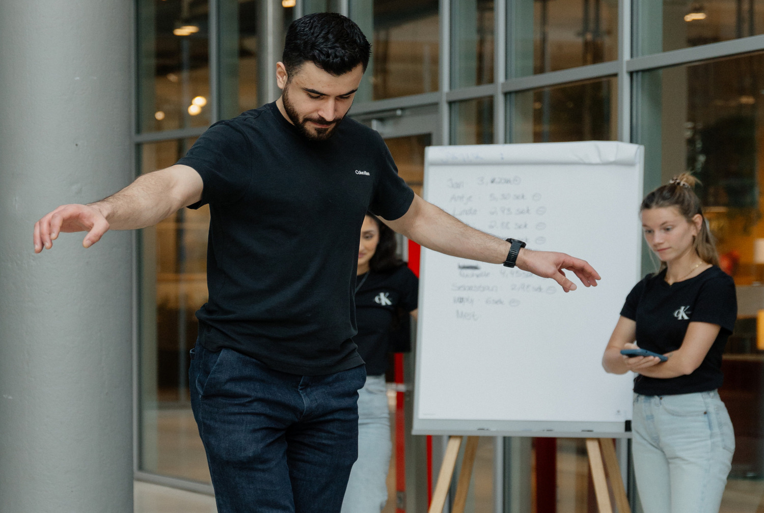 Adult, Male, Man, Person, Pants, Female, Woman, Necklace, White Board, Mobile Phone