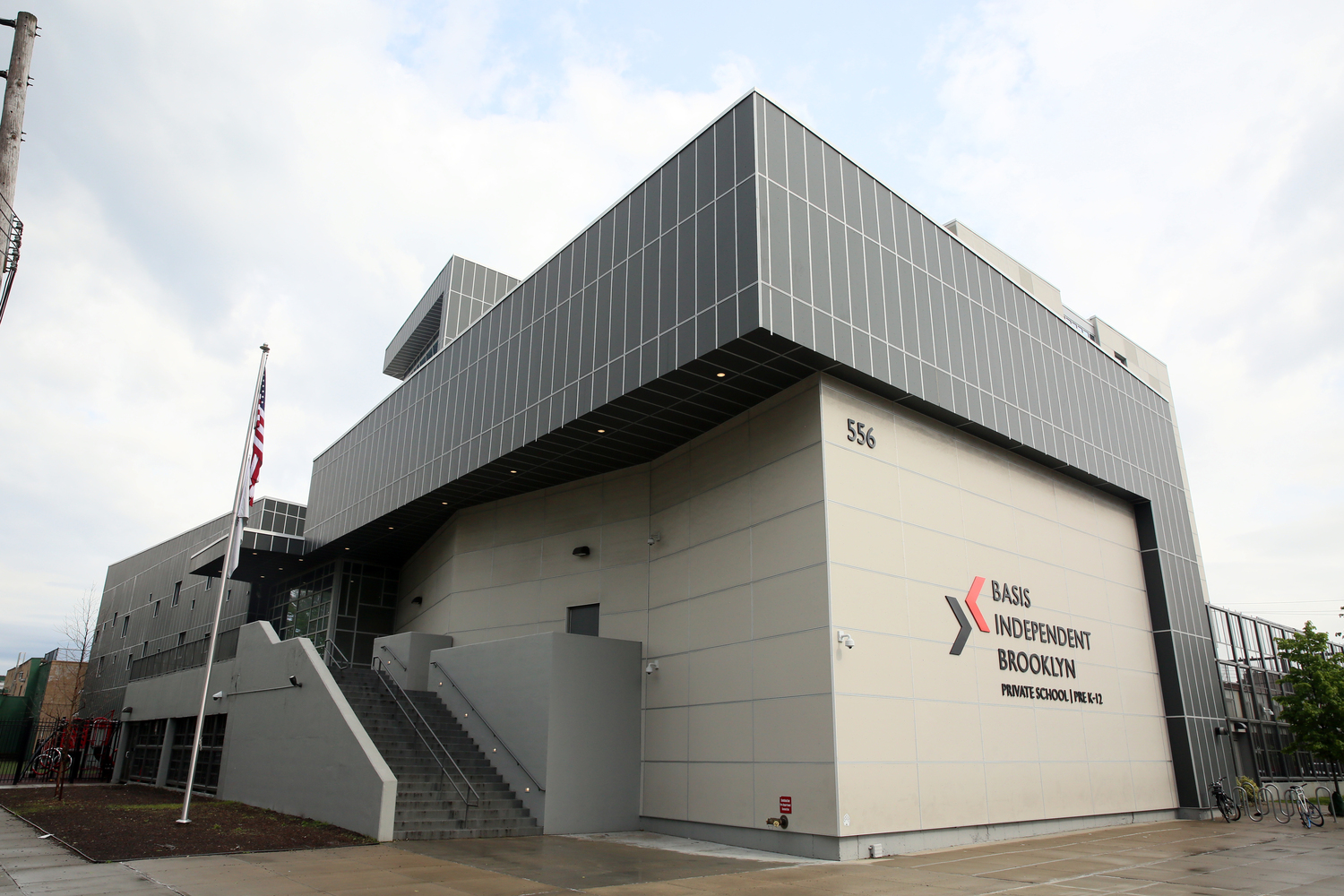 Architecture, Building, Office Building, Flag, Bicycle, Transportation, Vehicle, Hangar