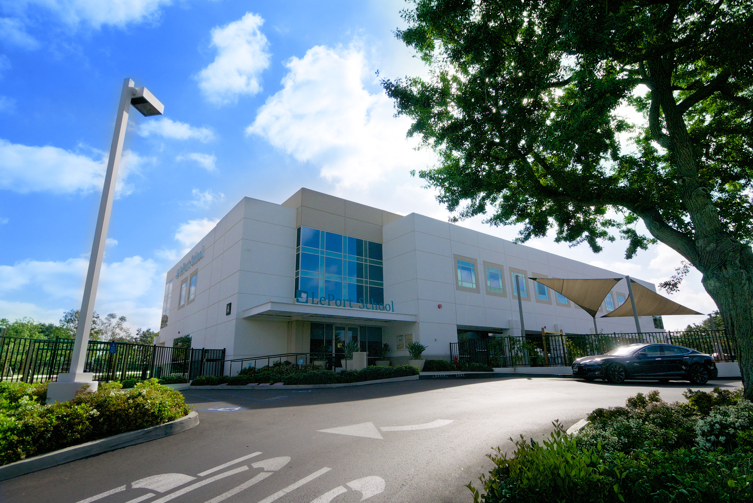 Building, Office Building, Plant, Car, Vehicle, City, Person, Tree, Machine, Wheel