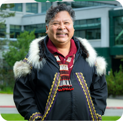 Photograph of Phillip "Aarnaquq" C. on the University of Alaska Anchorage campus. 