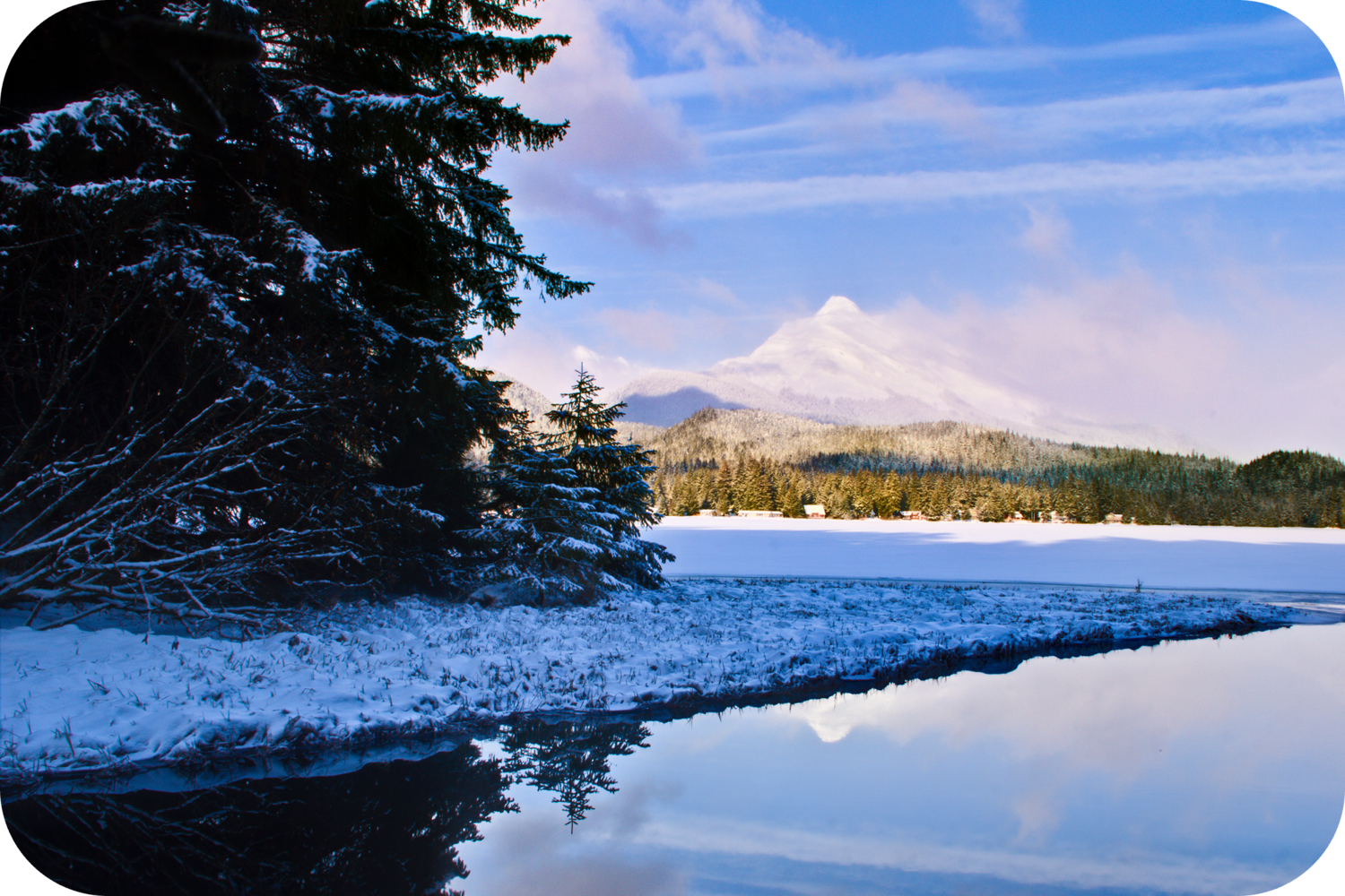 Image of Auke Lake and reflection during the winter time. 