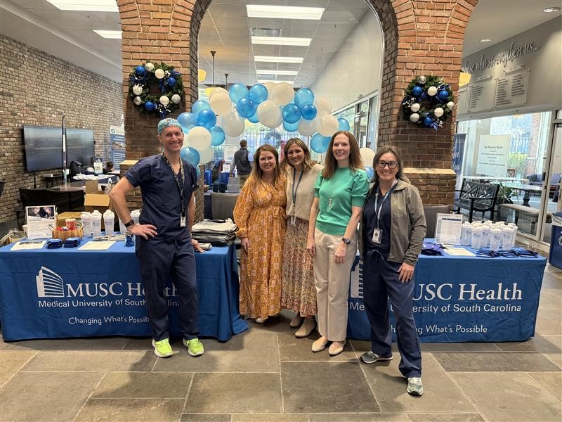 People, Person, Shoe, Adult, Male, Man, Groupshot, Desk, Female, Woman