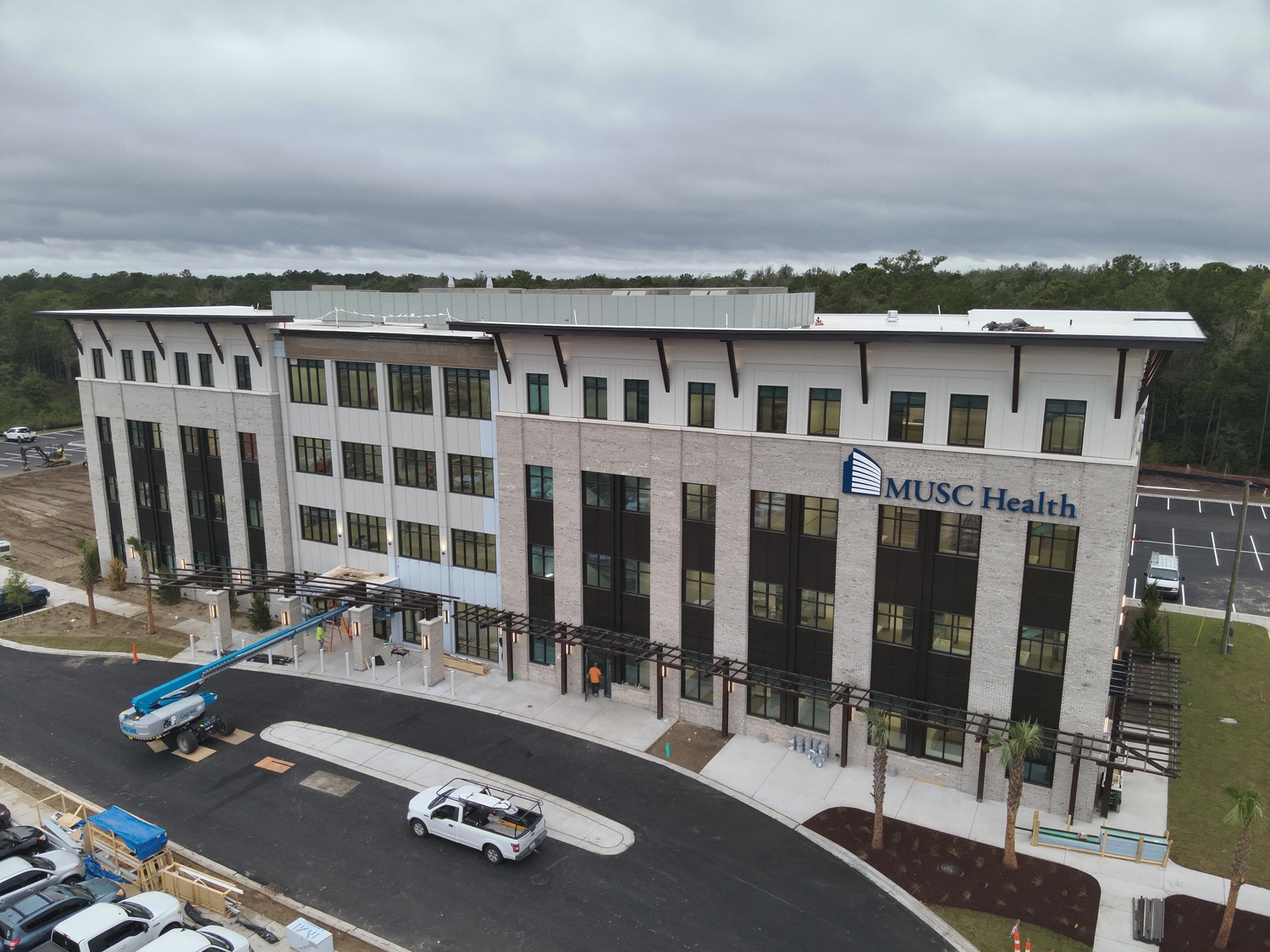 Architecture, Building, Office Building, Car, Transportation, Vehicle, Person, Fire Hydrant, Hydrant, Hospital