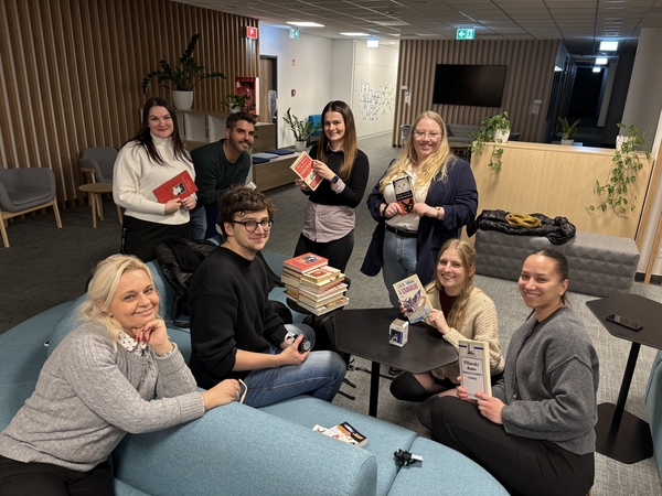 People, Person, Couch, Adult, Female, Woman, Living Room, Chair, Glasses, Belt
