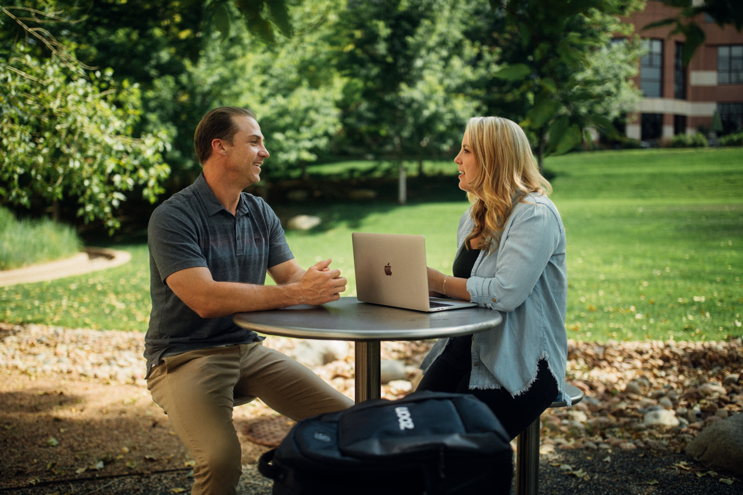 Adult, Female, Person, Woman, Male, Man, Conversation, Laptop, Handbag, Desk