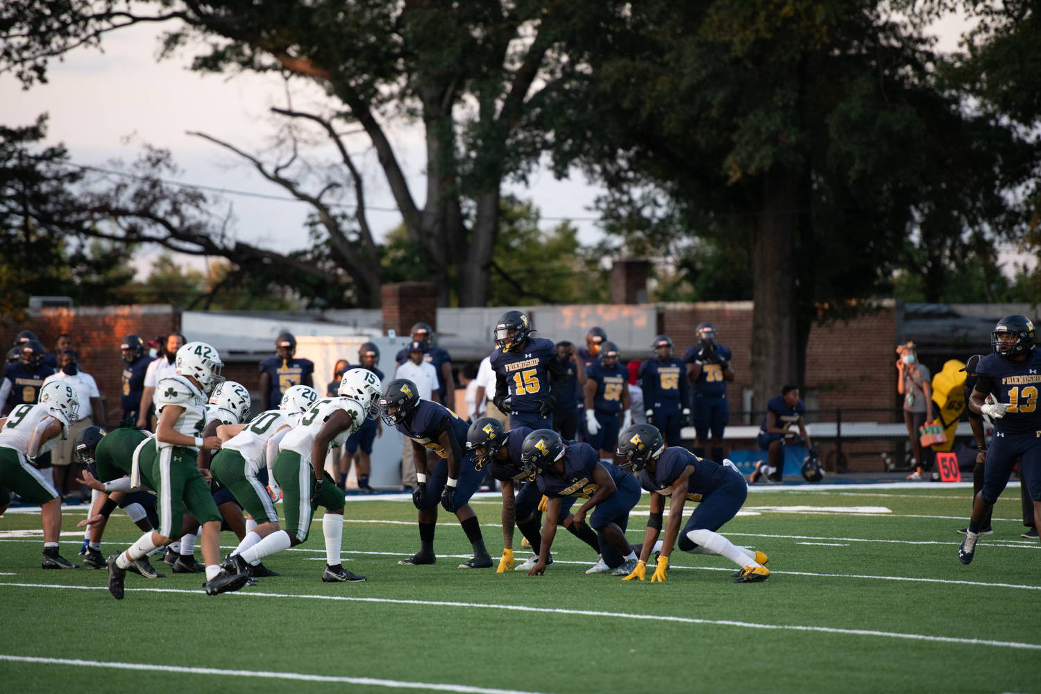People, Person, Helmet, Glove, Shoe, Adult, Male, Man, Playing American Football, Handbag