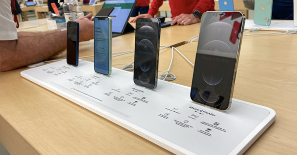 Mobile Phone, Phone, Electronics, Person, Speaker, Laptop, Computer, Furniture, Table, Desk