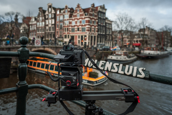 Boat, Transportation, Vehicle, Metropolis, Person, Electronics, Camera, Water, Bicycle, Machine