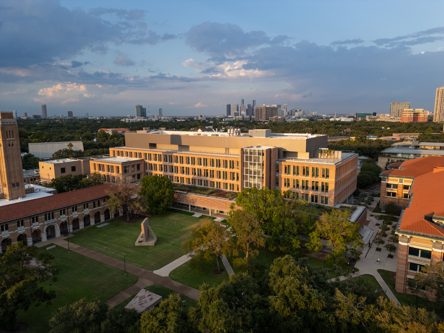 Architecture, Building, Campus, Office Building, Outdoors, Urban, City, Neighborhood, Cityscape, Person